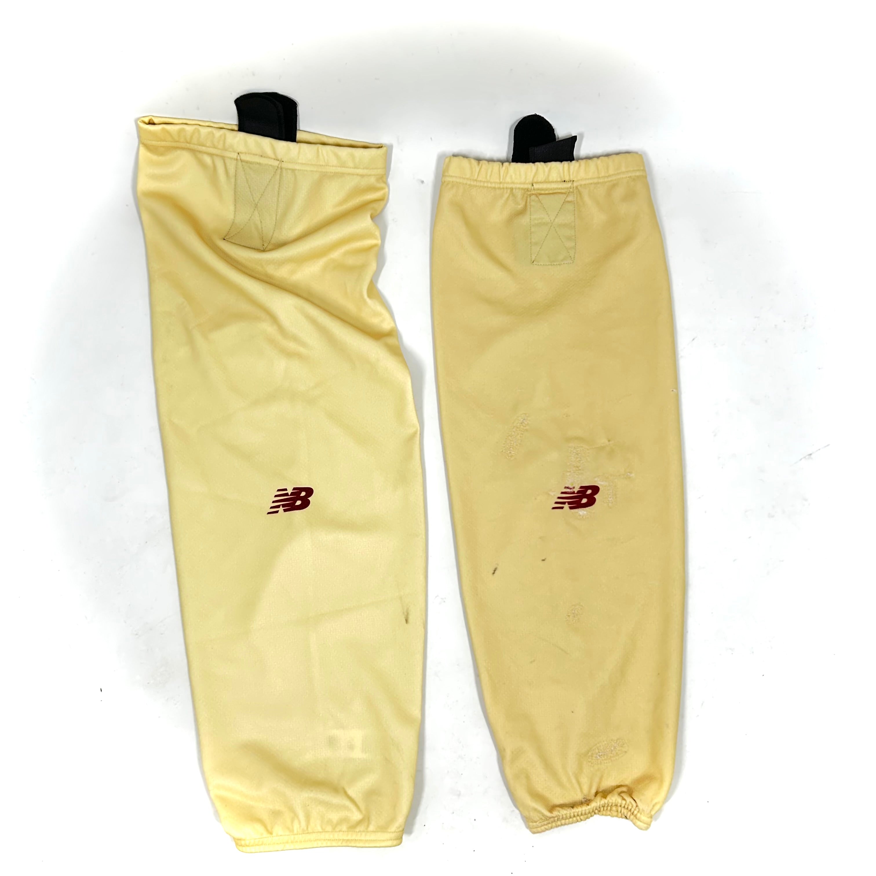 NCAA - Chaussettes de hockey New Balance d'occasion (beige)